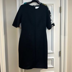 Lightly worn classy black sheath dress with chevron ribbed design- great LBD